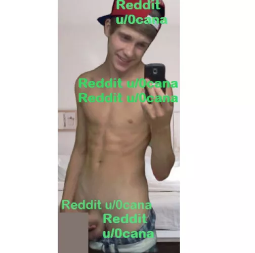 18, American. Wearing red hat, blue checkered boxers, and white belt.