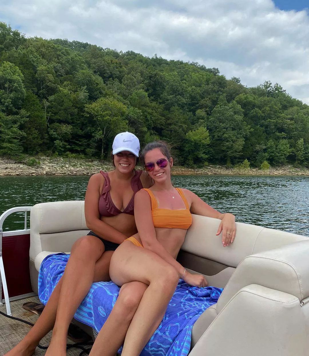 [2] On a boat by the river