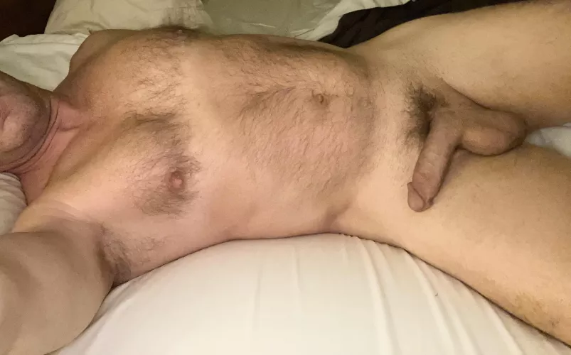 (52), stretched out on my bed