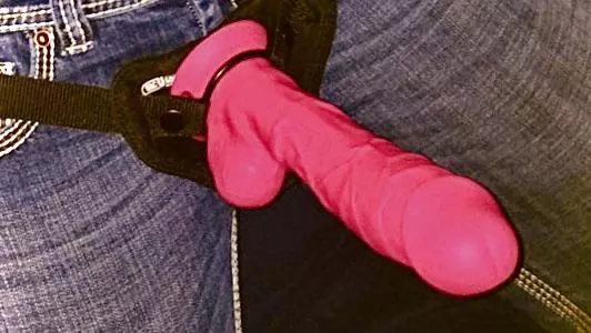 A neon pink dildo, a trusty Vac-u-Lock harness, and tight bootcut designer jeans… some styles never go out of fashion: