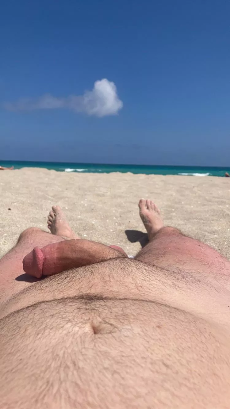 Almost hard on the nude beach.