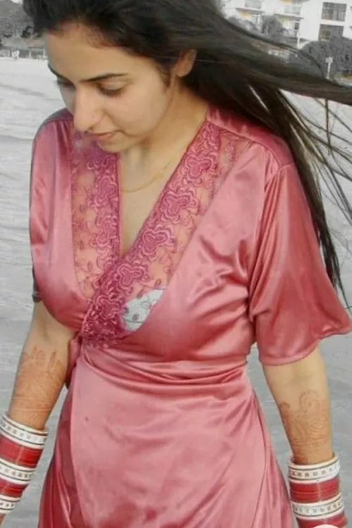 Anyone having more pictures of her or name?