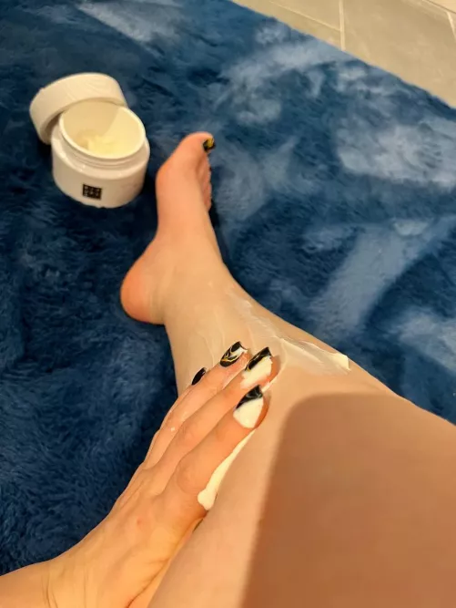 Apply cream to my leg and feet to keep my skin nice and soft.