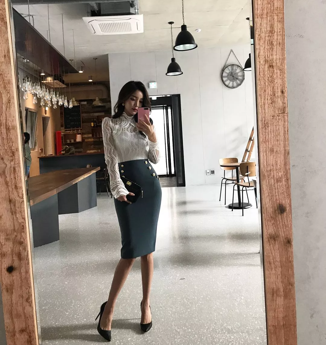 Asian lady in pencil skirt