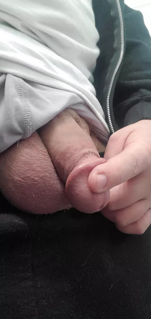 Balls so big, he rests on them.