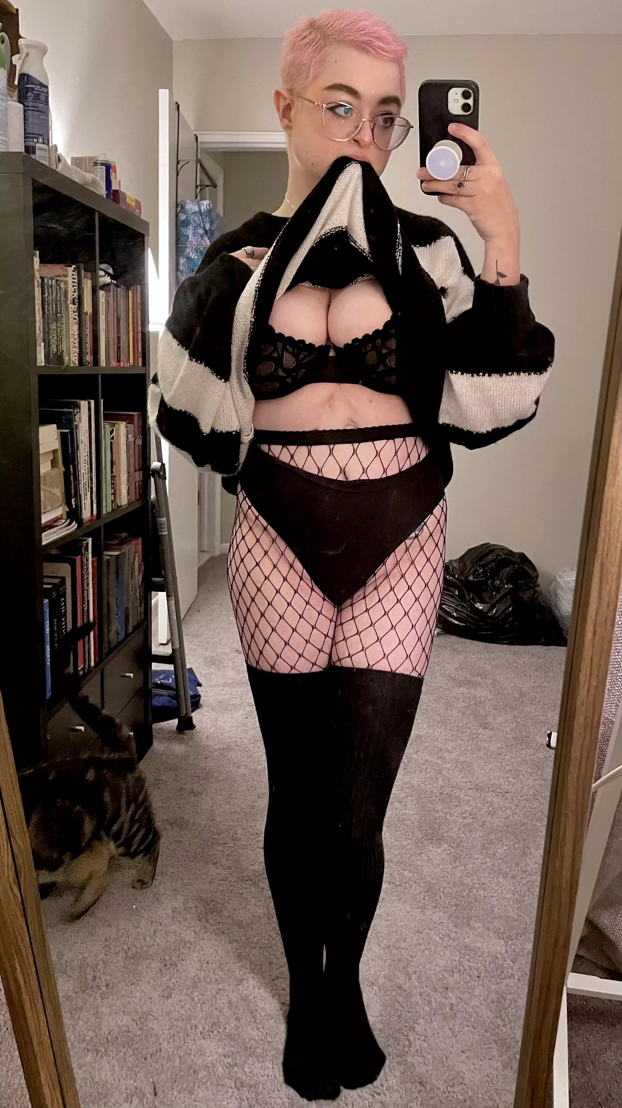 big sweater hiding some big surprises