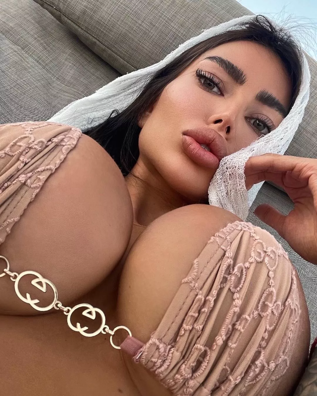 Bikini is squeezing these big tits