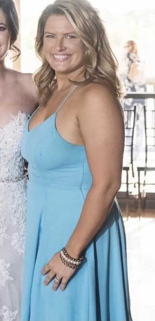Braless at a friend’s wedding showing off those tits to everyone