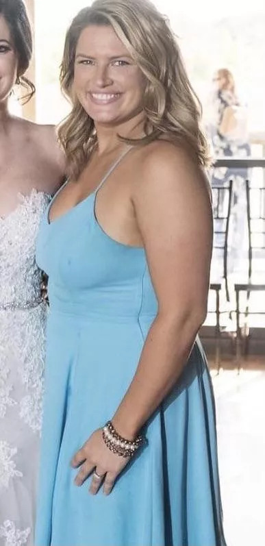 Braless at a friend’s wedding showing off those tits to everyone