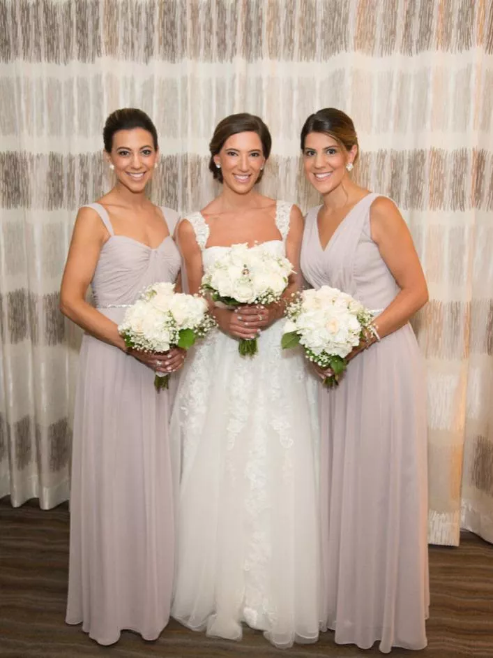 Bride with her bridesmaid sisters
