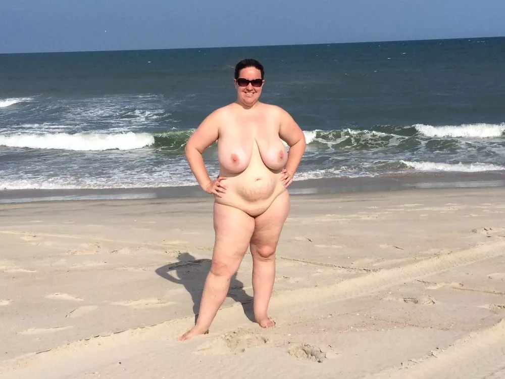 Busty nudist posing on the beach (1 more in comments)
