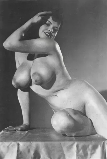 Busty vintage nude poser with puffies!
