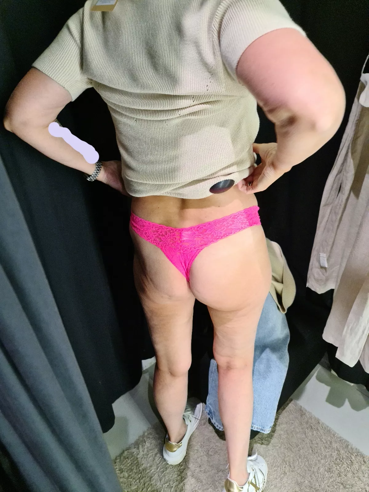 Changing room trying on a dress and panties