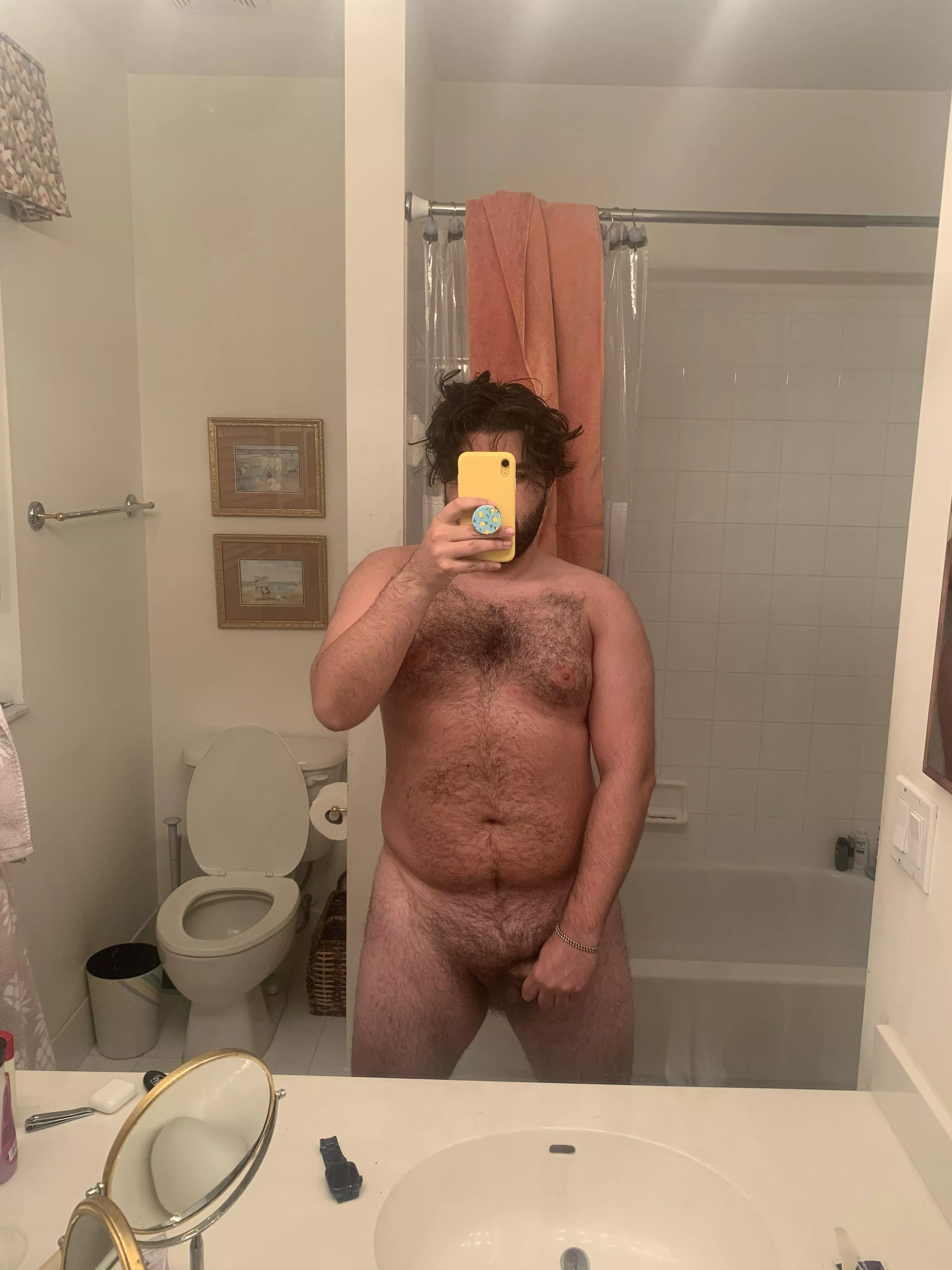 Checking out my tan progress after a day by the pool