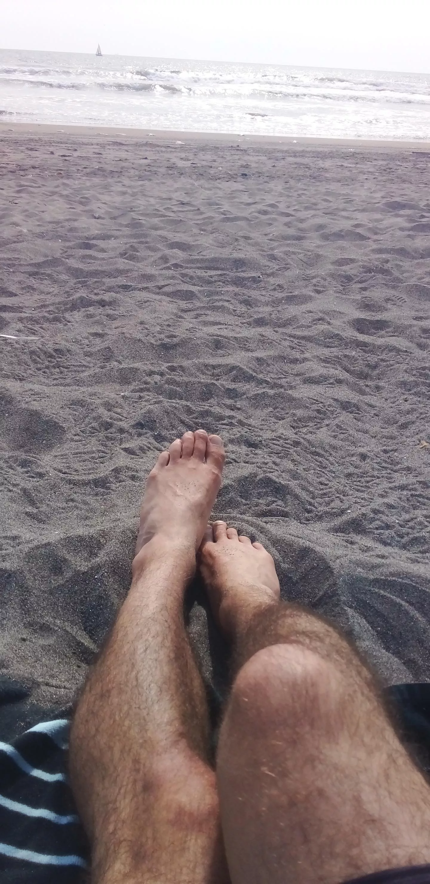 Chillin' at the beach. Who else likes to feel the warm sand on your feet?