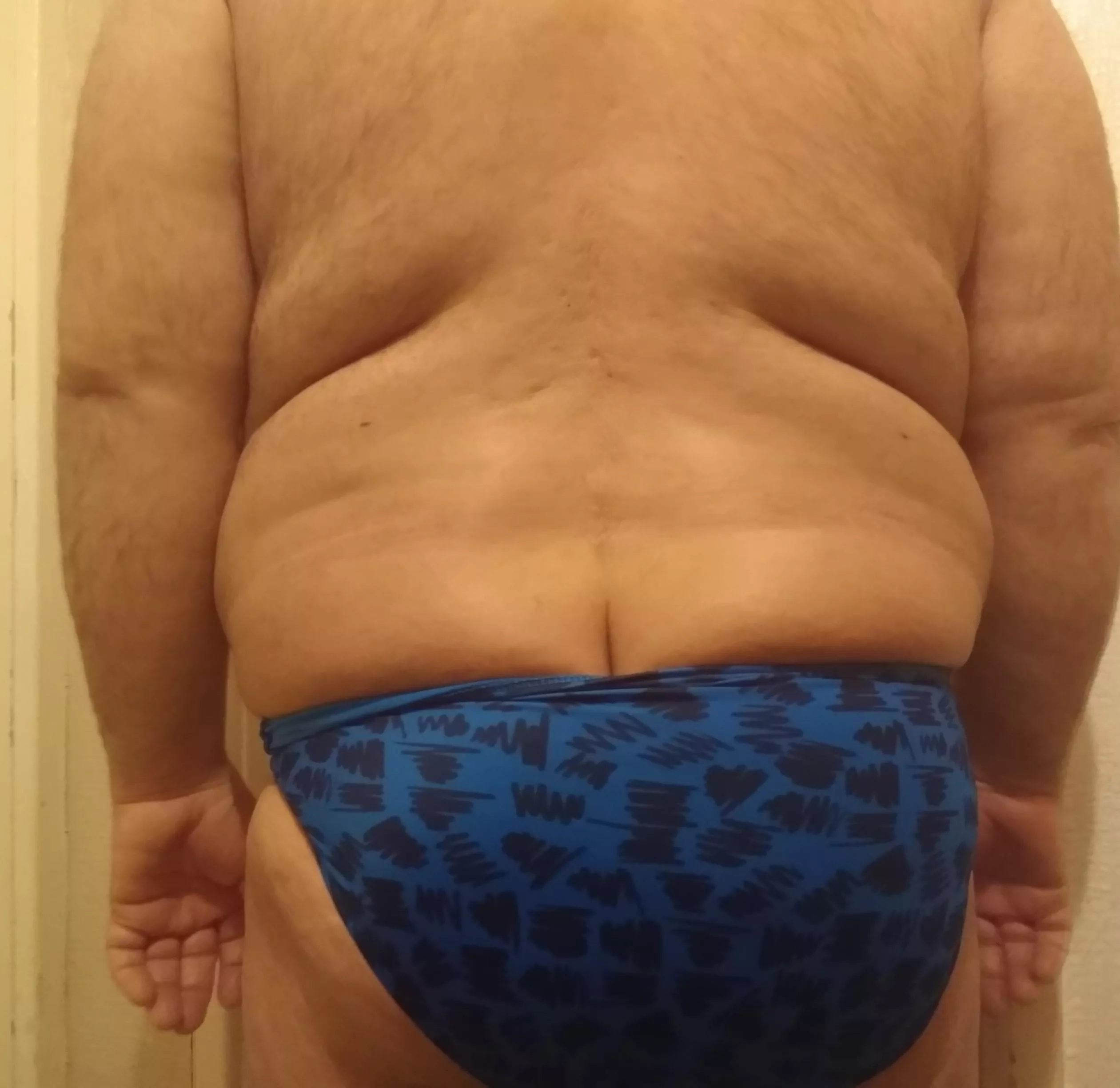 Chub squuezed into swim pantues