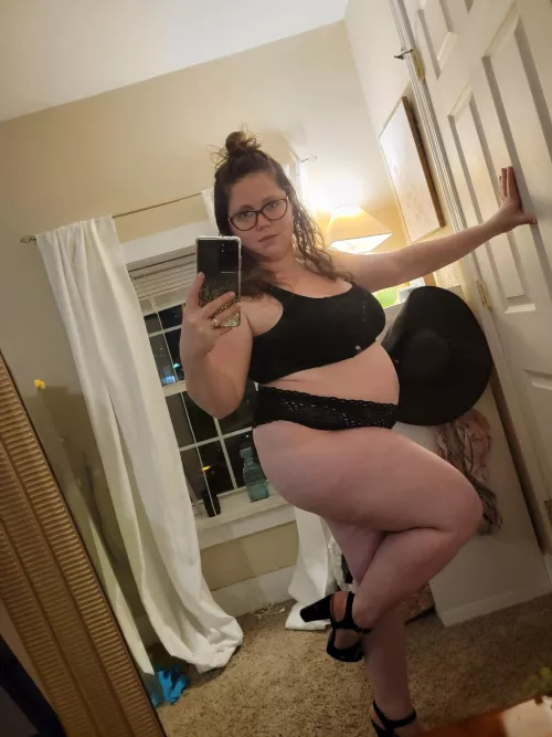 Chubby girl in crop top, lace panties and heels