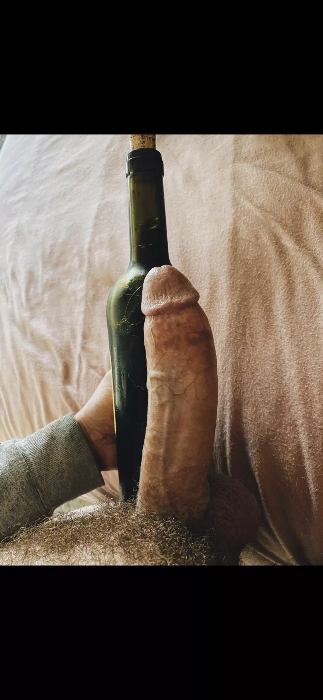 Compared to a wine bottle