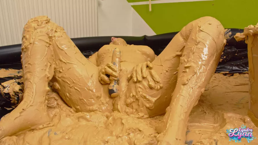 completely covered in mud