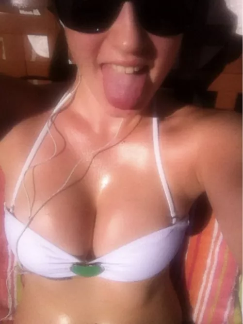 Cute bikini babe showing off her tongue