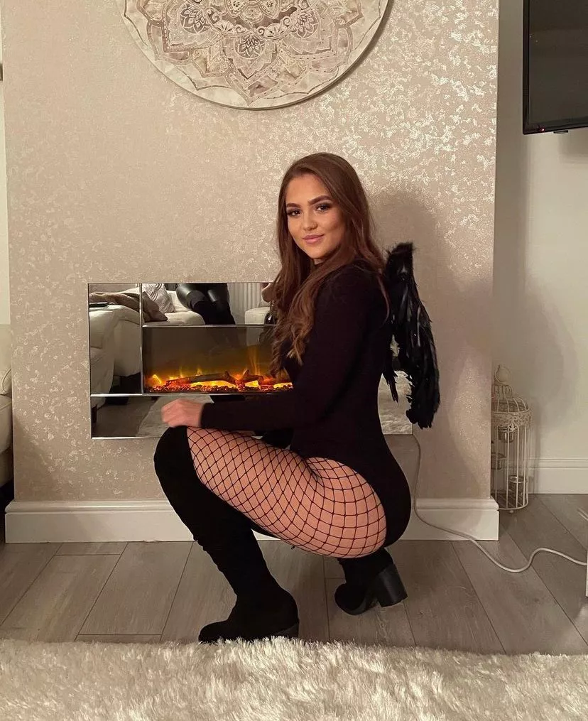 Dark angel in fishnets