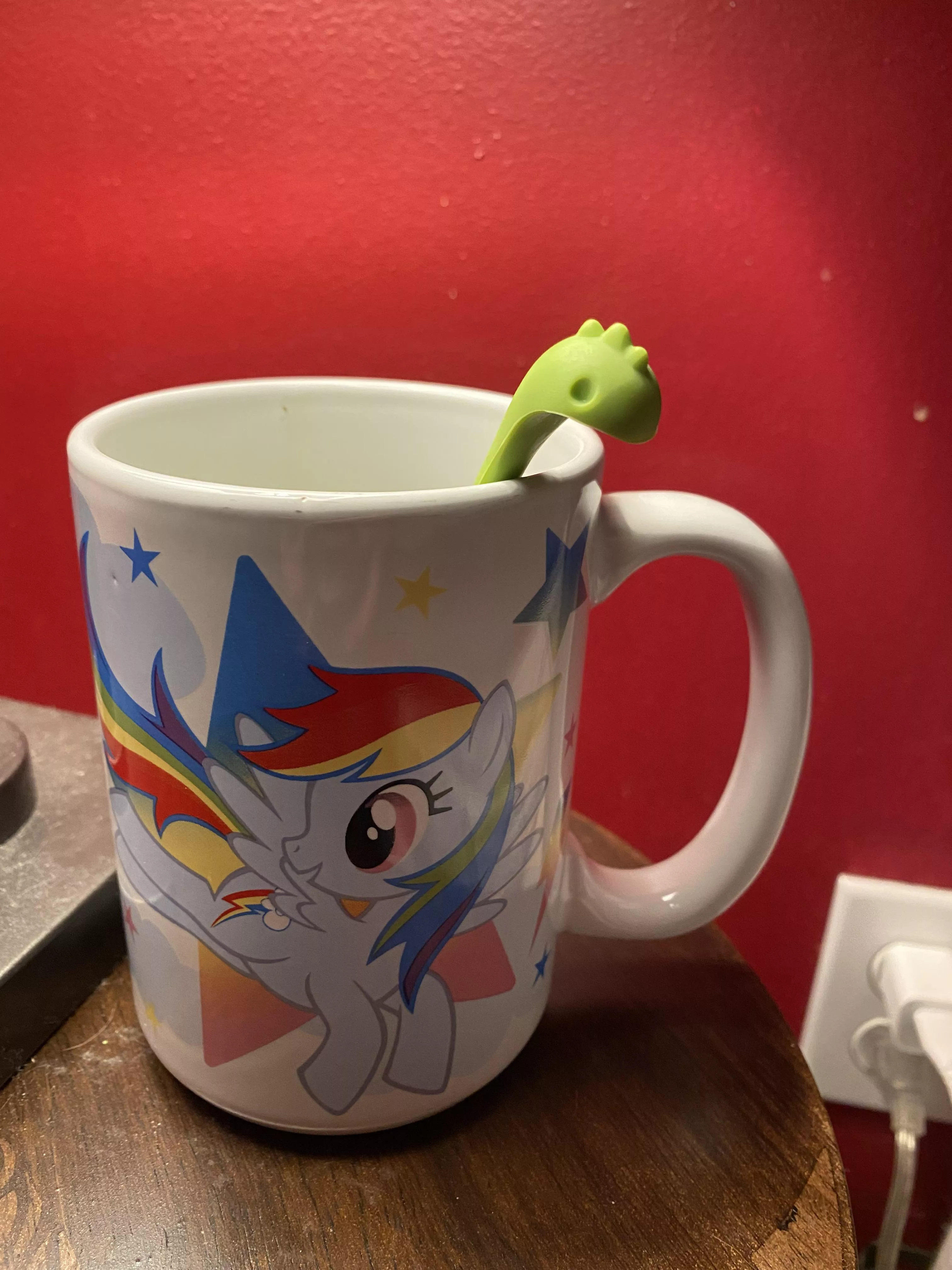 Dino tea diffuser with a rainbow dash mug is how I drink my sleepy time tea 💖🦕🦄