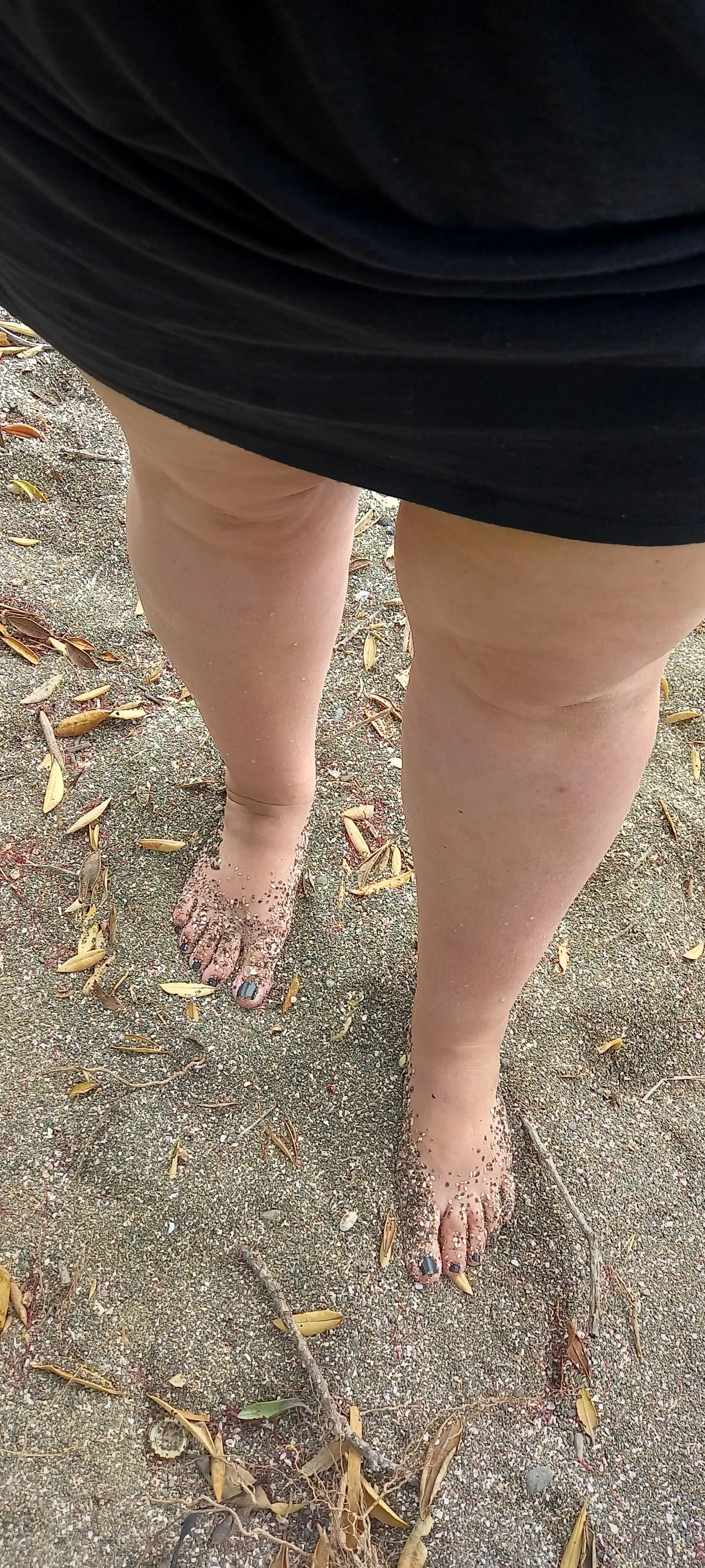 Dirty beach feet.