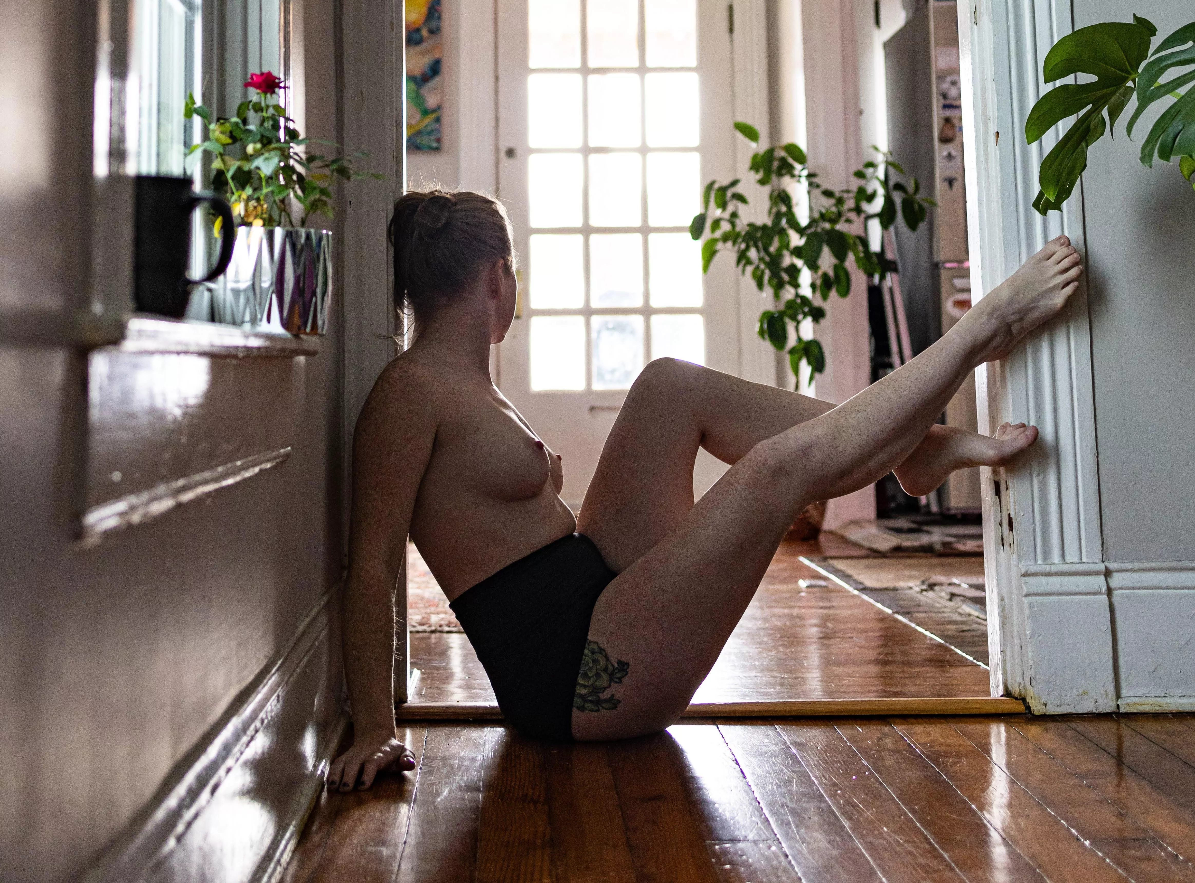 Disarmingly divine in the doorway.