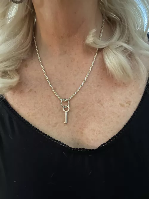 Dom’s new key to my chastity lock.