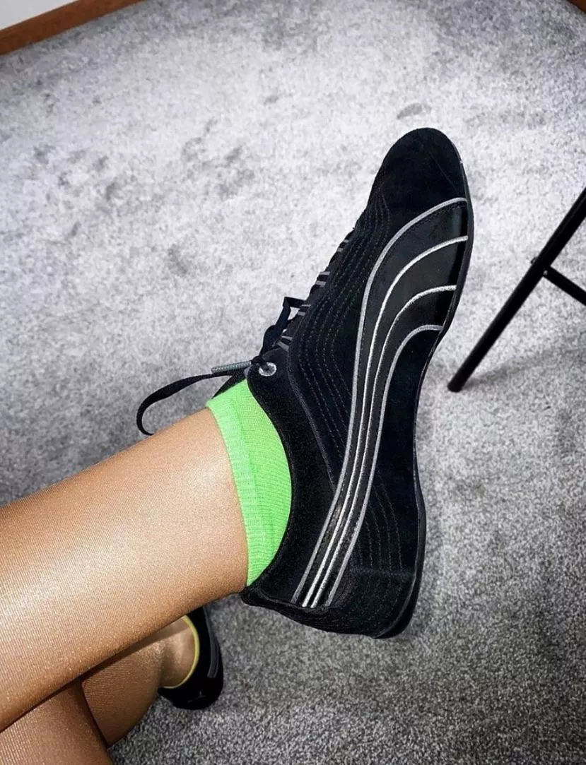 Don't you just love my glossy Wolford tights with my jet black puma soleil shoes?