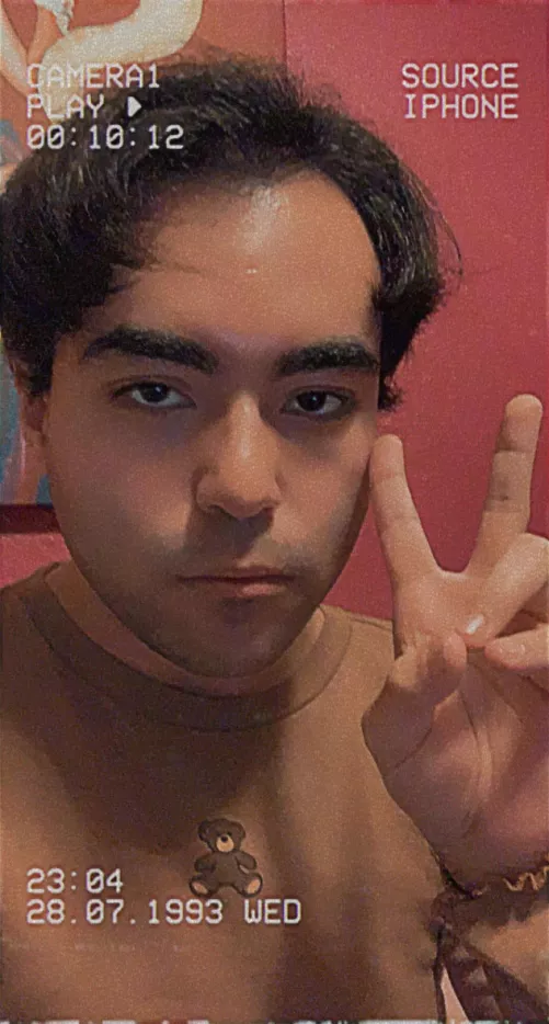 dumb gay twink takes a break from arceus to snap a picture