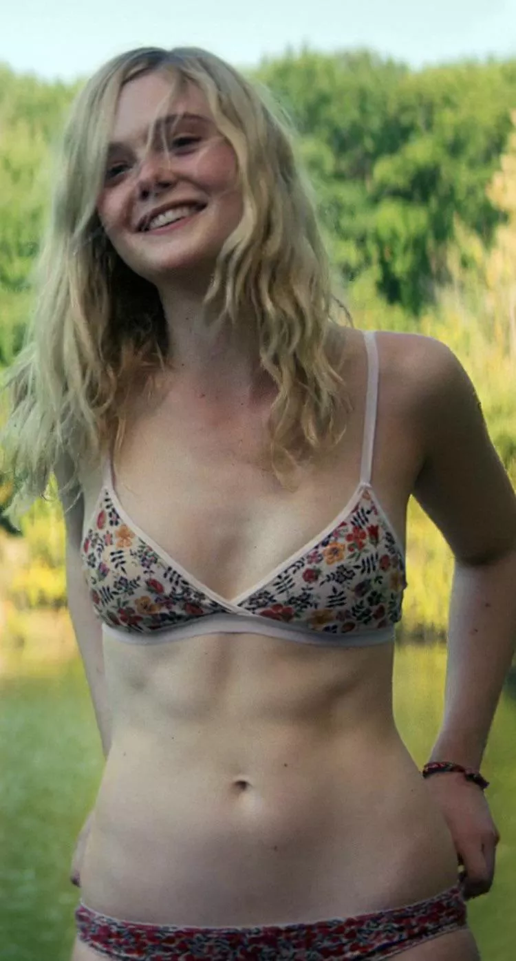 Elle Fanning’s abs need to be coated, preferably with a bud