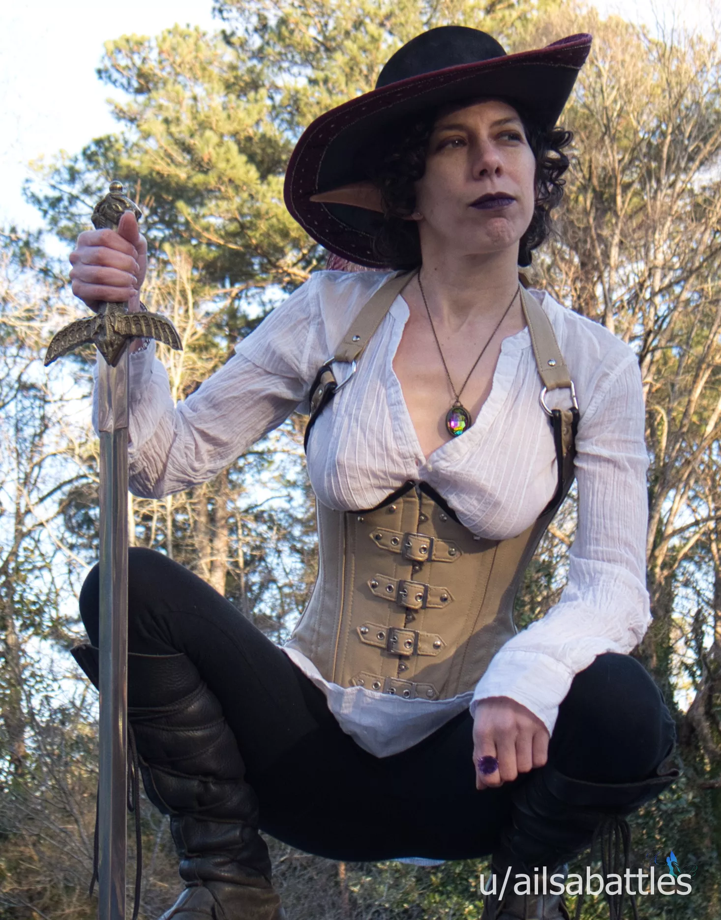 Elven warrior considering her next move