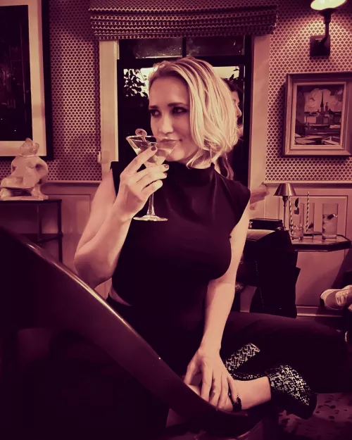 Emily Osment having a cocktail