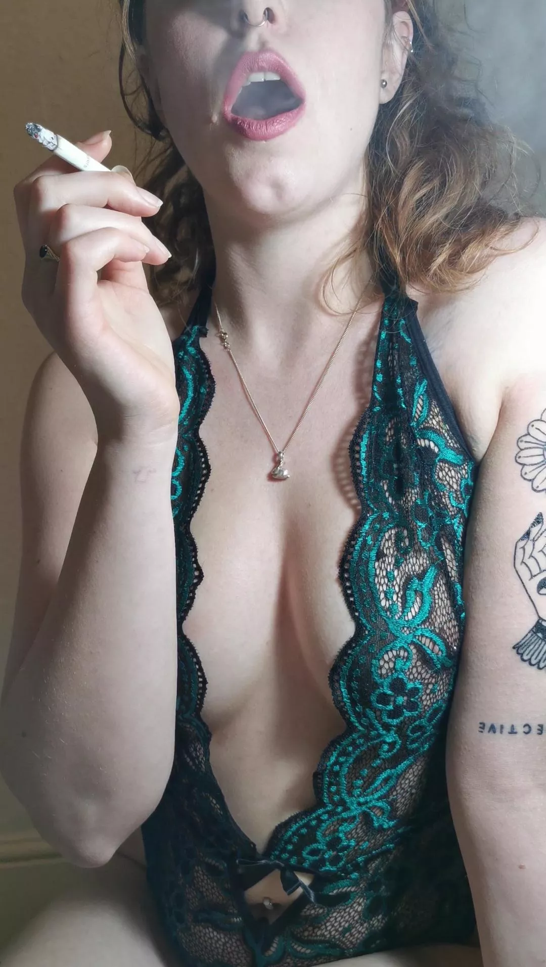 Enjoying a cigarette in my lacy one piece