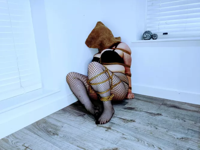 [F] Captured, tied and hooded.