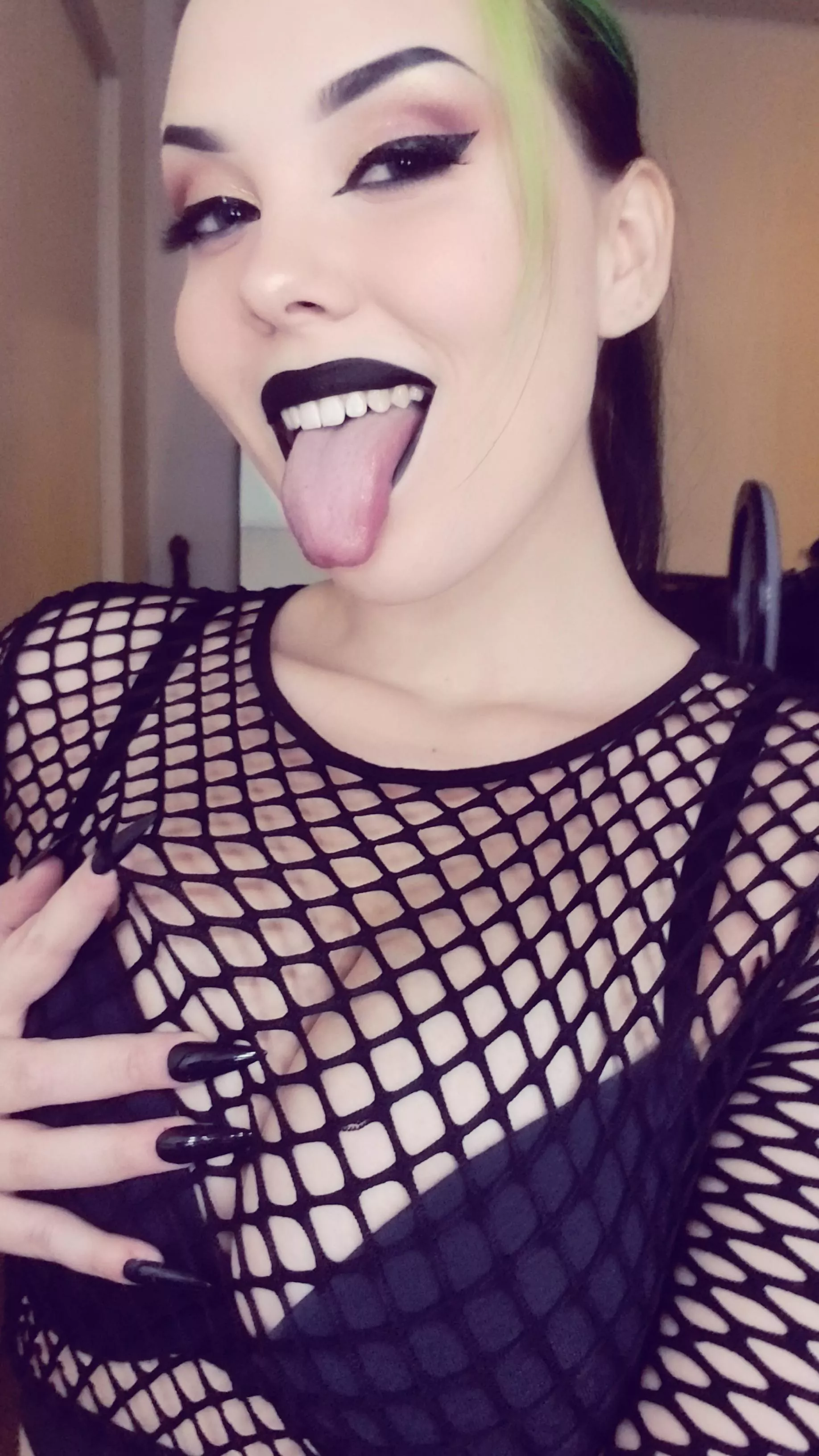 Get your tongue wrapped up in this fishnet top. 😈 Get your tongue wrapped up in this fishnet top. 😈