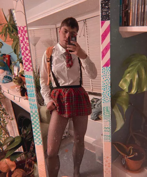 Getting ready for my first day of queer gamer school 🥺 what do we all think of my uniform? 📚🏳️🌈