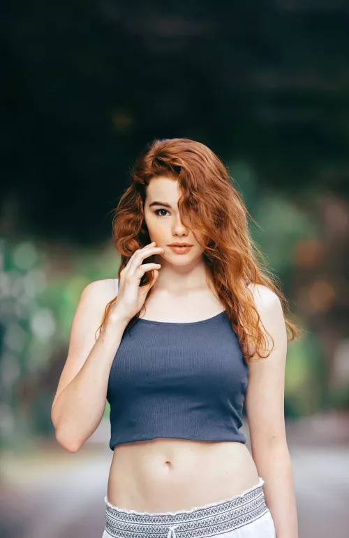 Gingers are so cute when they hide behind their hair. Sabrina Lynn