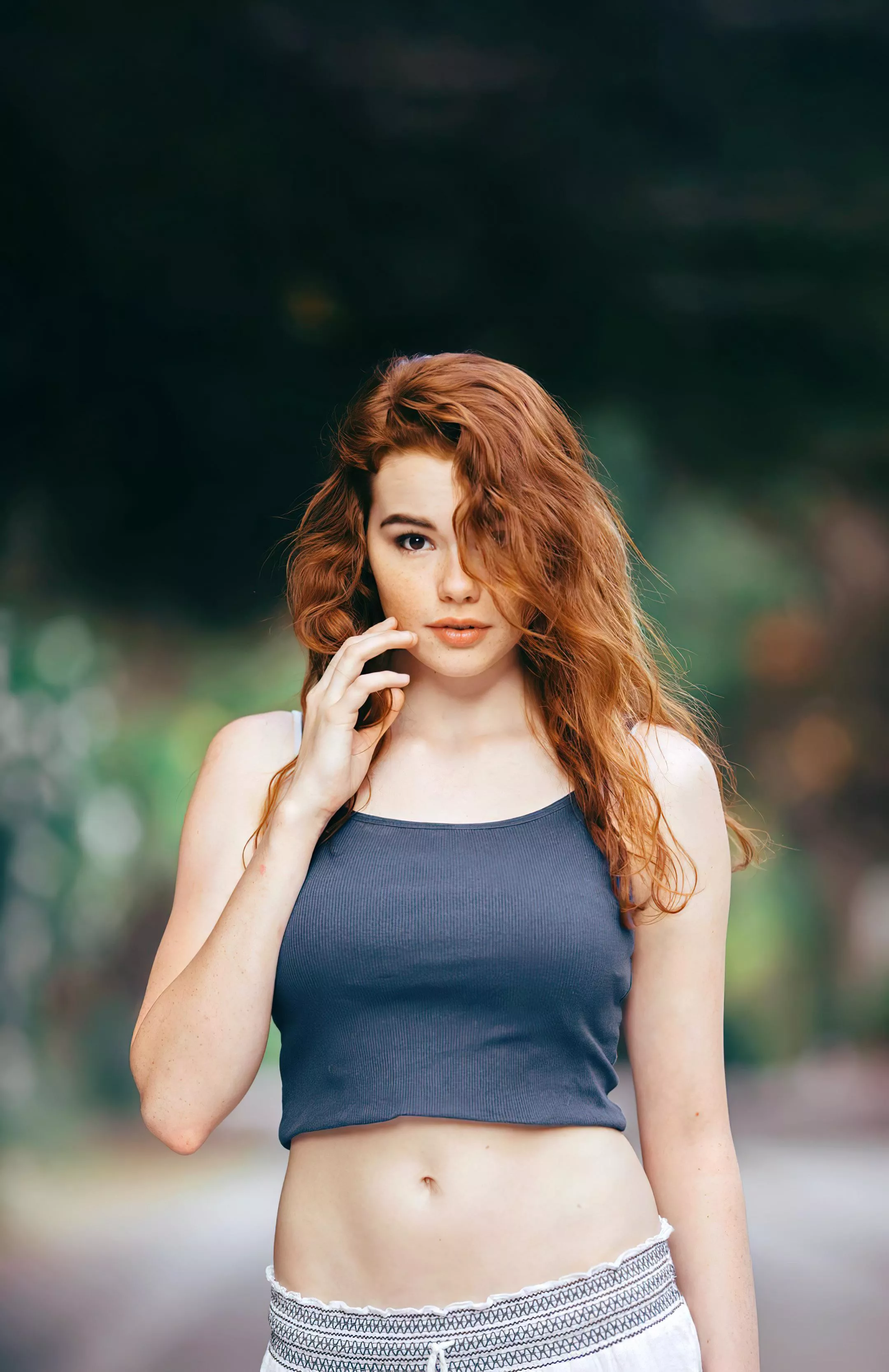 Gingers are so cute when they hide behind their hair. Sabrina Lynn