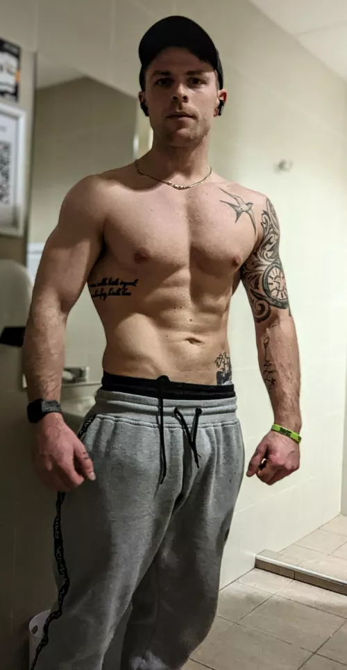 Grey sweatpants and gym changing rooms...
