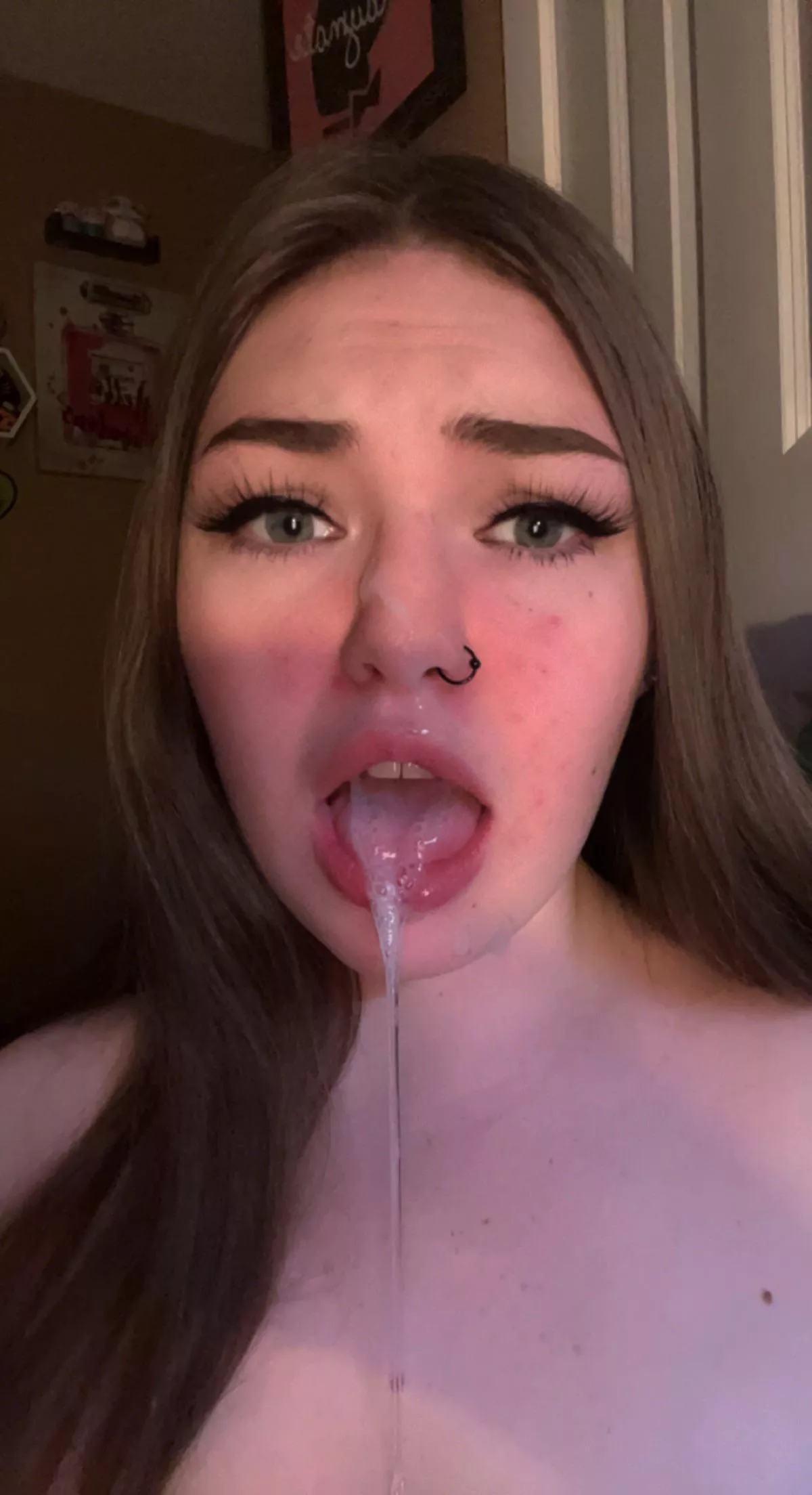 Half in my mouth, half on my face