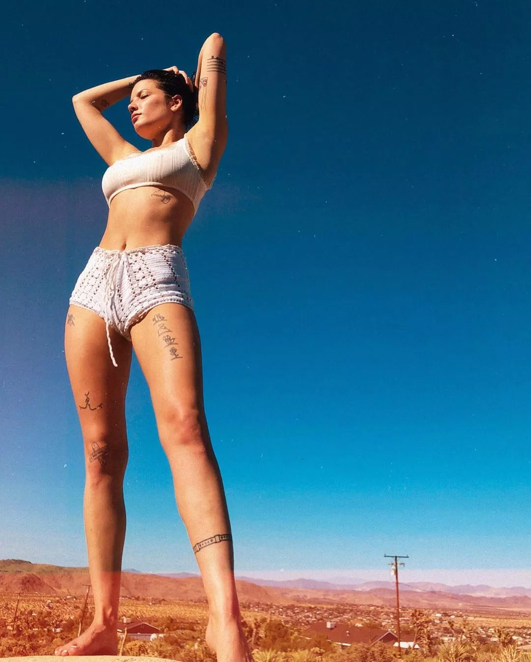 Halsey weari g nice shorts.