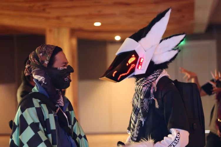 Happy fursuit friday! I be with my handler (Kuro Yatogami on fb). Photo by (J.J. Go on fb) on a local convention.