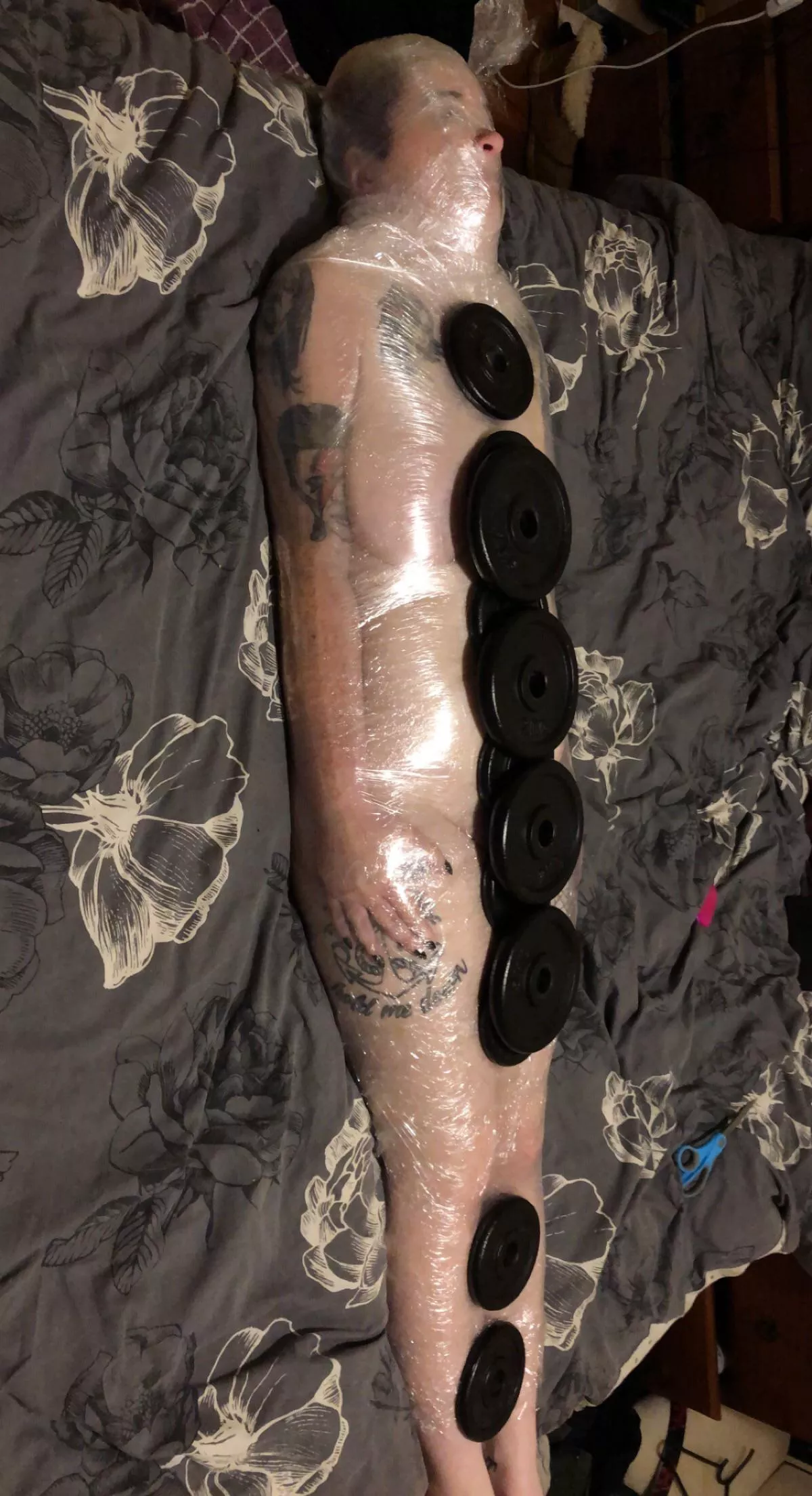 Having fun with gladwrap and weights.