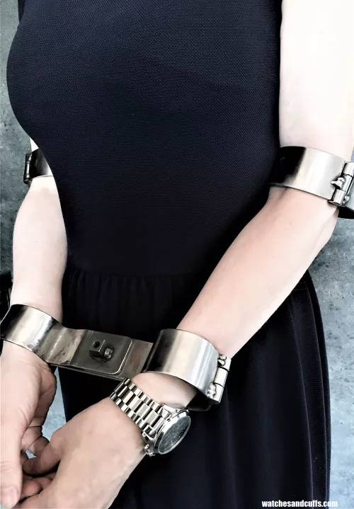 Helpless in steel - elbow shackles and rigid restraints