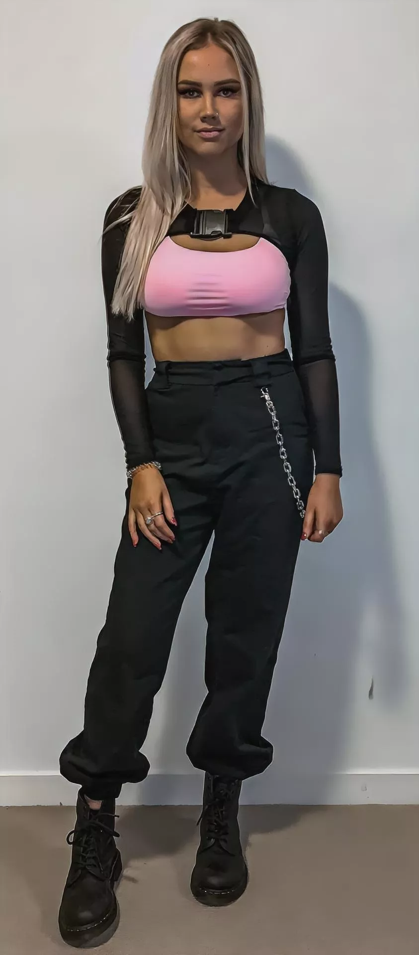 Her skin, the pink and the black work so well together.