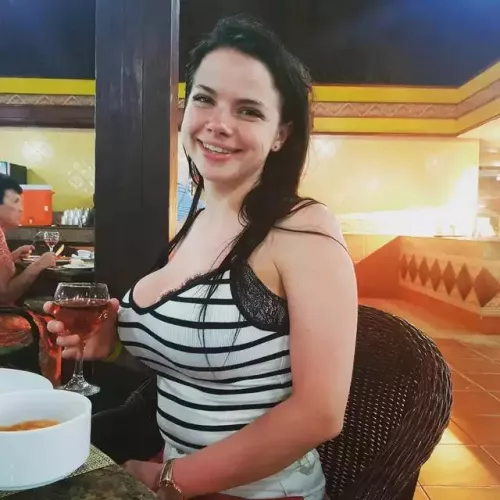 Her smile is big, guess what's bigger than that