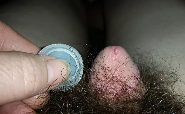 Here is a pic I took a while ago with me comparing my halfway hard penis to a water bottle cap.. Here is a pic I took a while ago with me comparing my halfway hard penis to a water bottle cap..