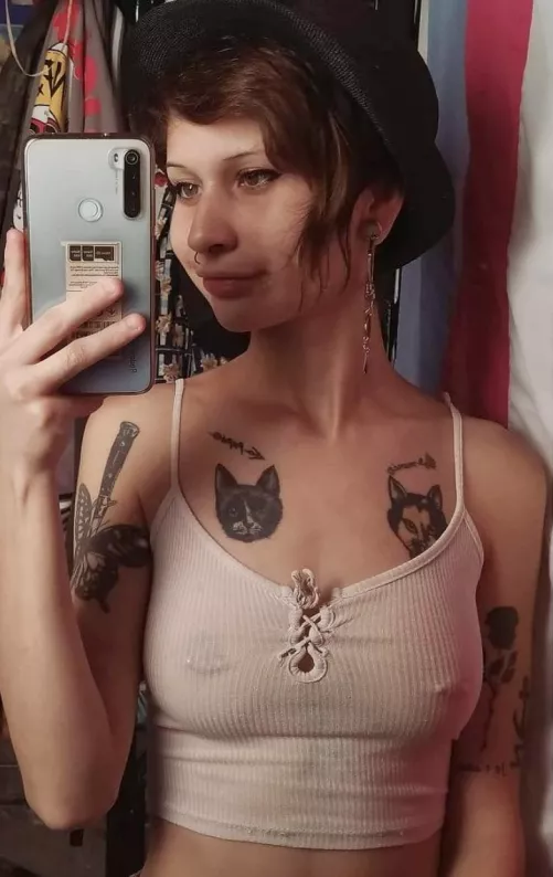 Hipster girl with pierced nipples